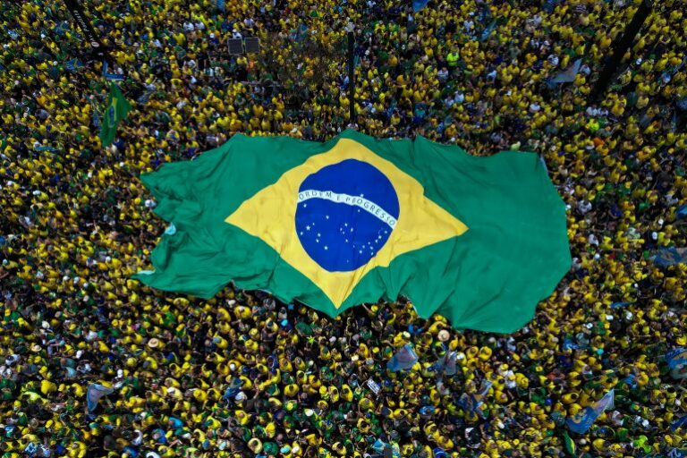 Lula and Bolsonaro spar in Brazil’s fiery first presidential run-off debate
